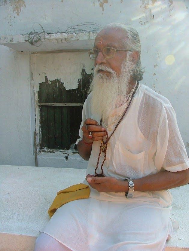 Baba Brahmananda chanting on Malas (51)