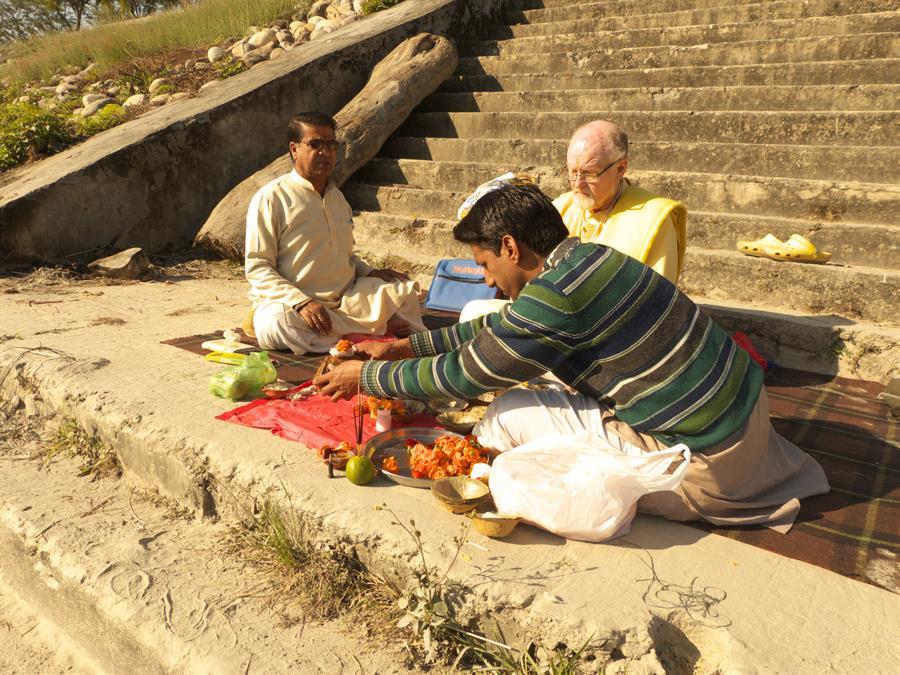 Performing a puja on the banks of Ganga.