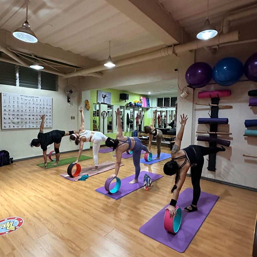 Yoga with Wheel class at CDO Pilates & Yoga Center