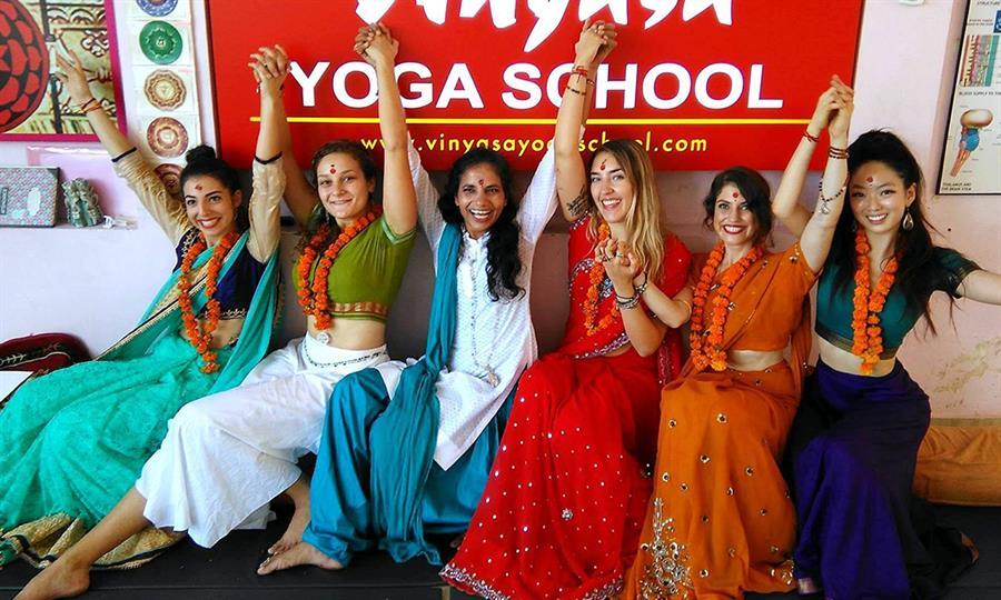 celebrating Graduation Vinyasa Yoga School.png