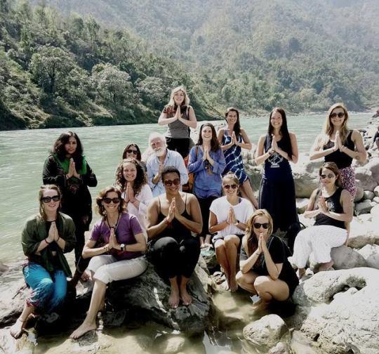Namaste pose of our students on Ganges beach