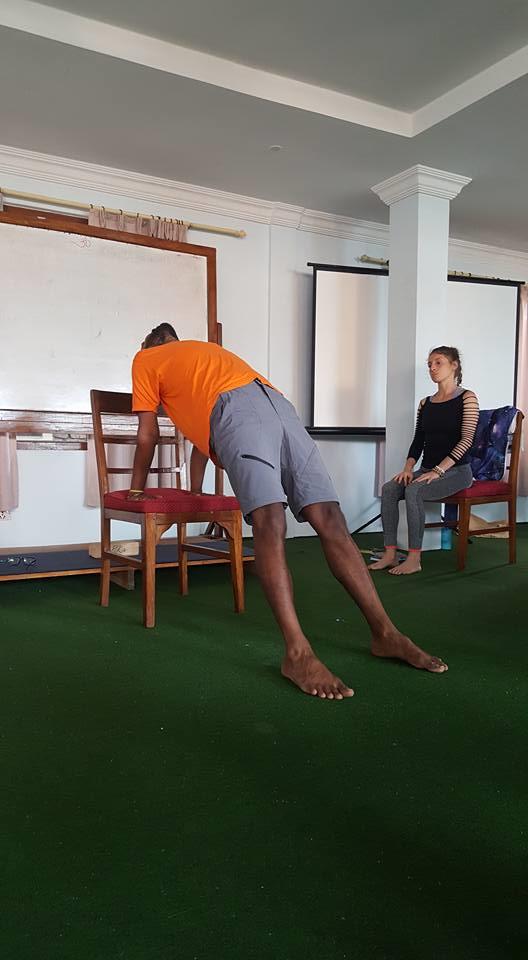 Chair yoga session at Rishikul Yogshala
