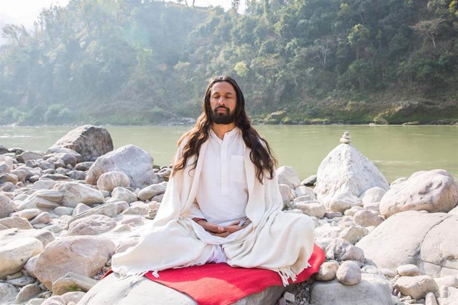 Yogi Ram Meditating by the Ganges