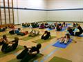 Teaching yoga to school kids