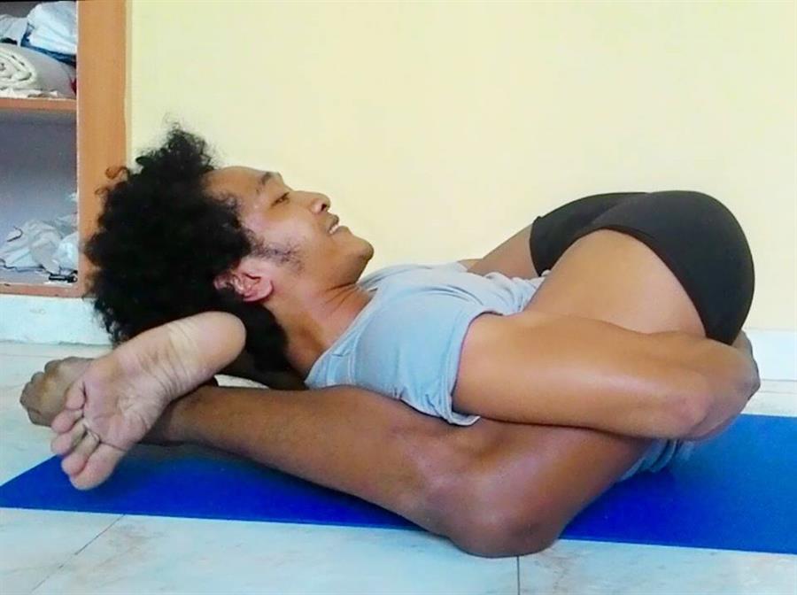 Yoga Nidrasana (sleeping yogi pose)