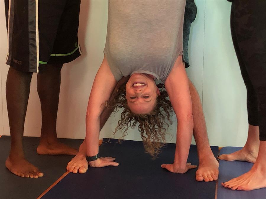 Amy in Adho Mukha Vrksasana (handstand)