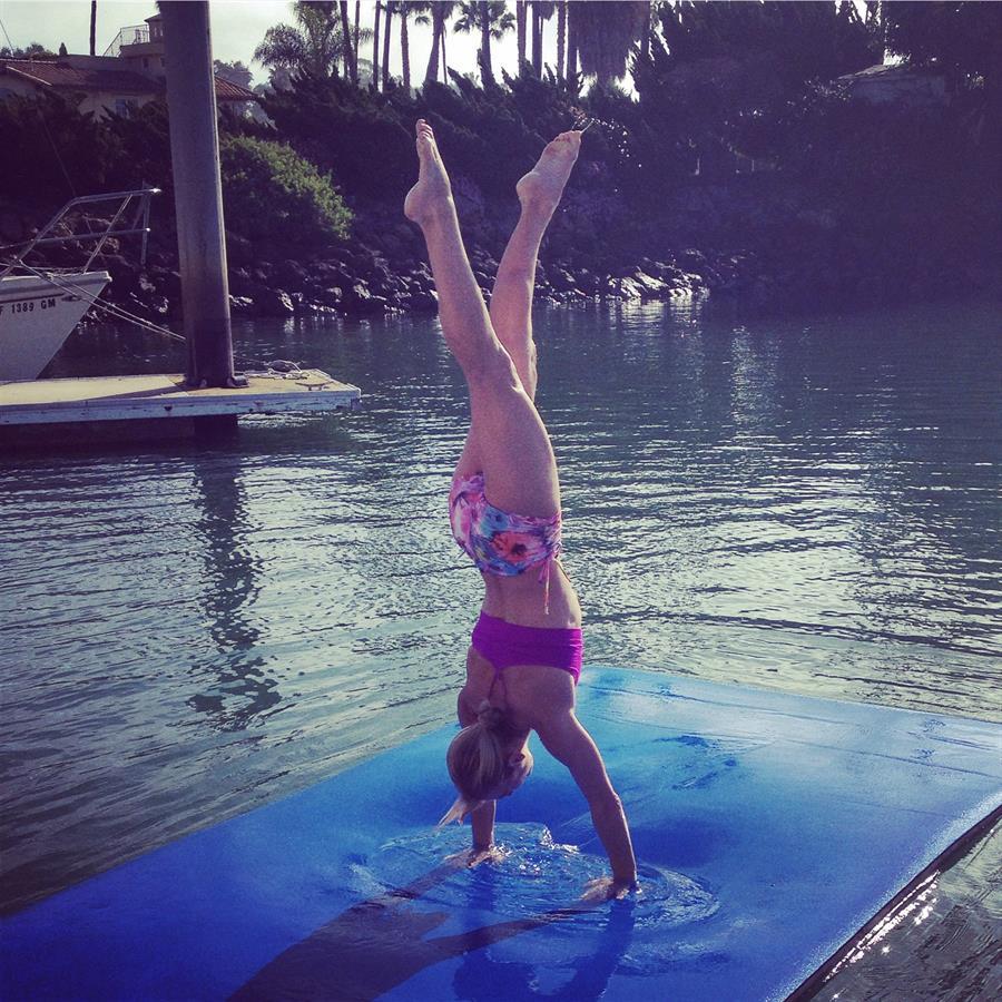 Handstand on a floating lilipad